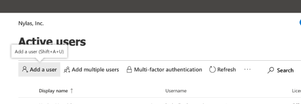 A close-up of the Microsoft Office 365 Admin Center "Active users" page. The "Add a user" option is highlighted.